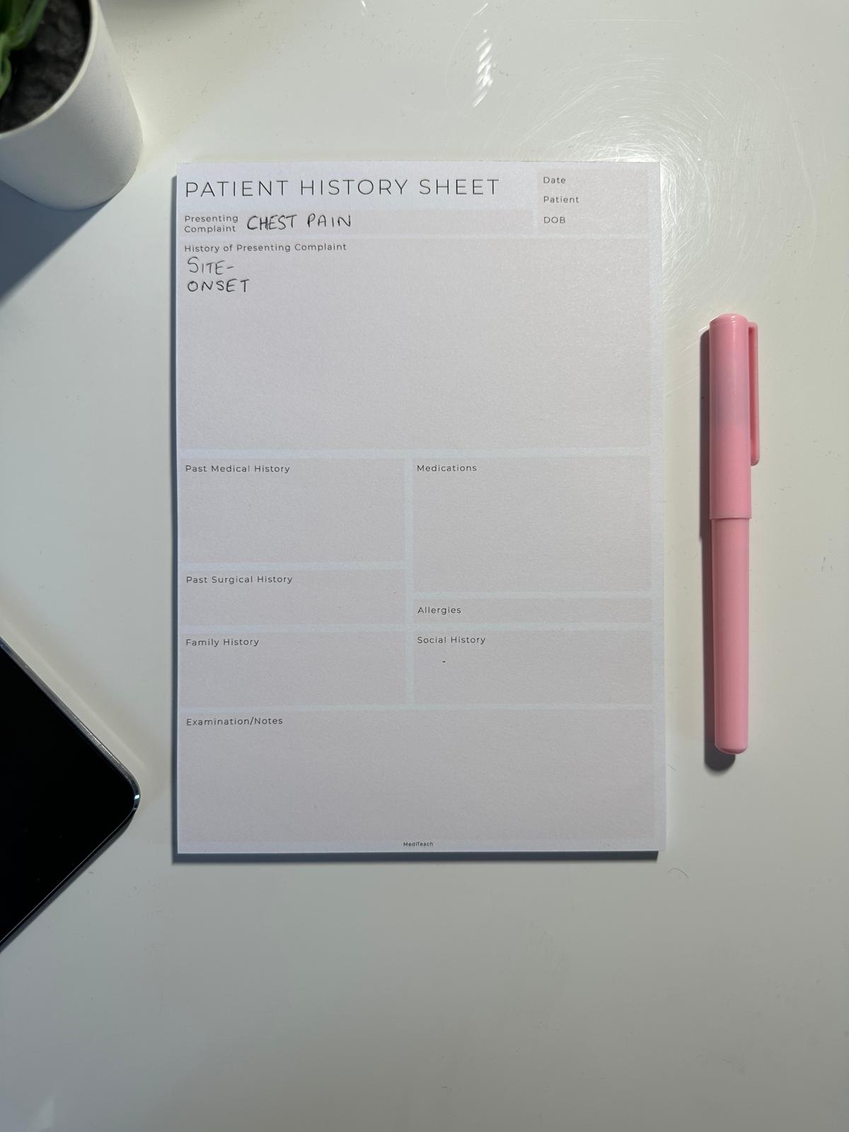 Medical student filling out a clinical history taking notepad